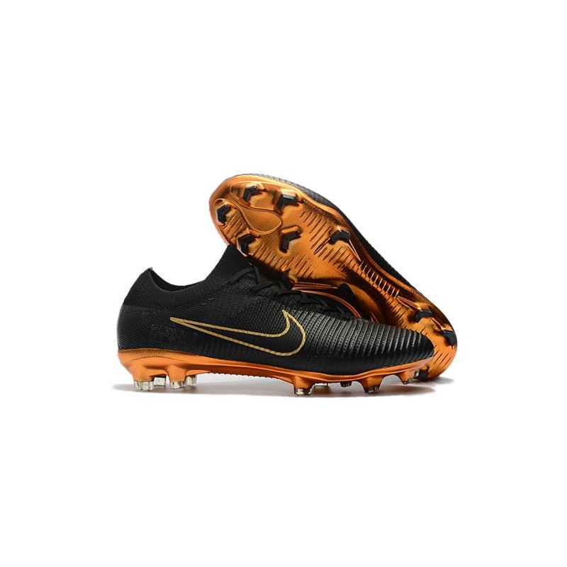 black and gold nike vapor cleats